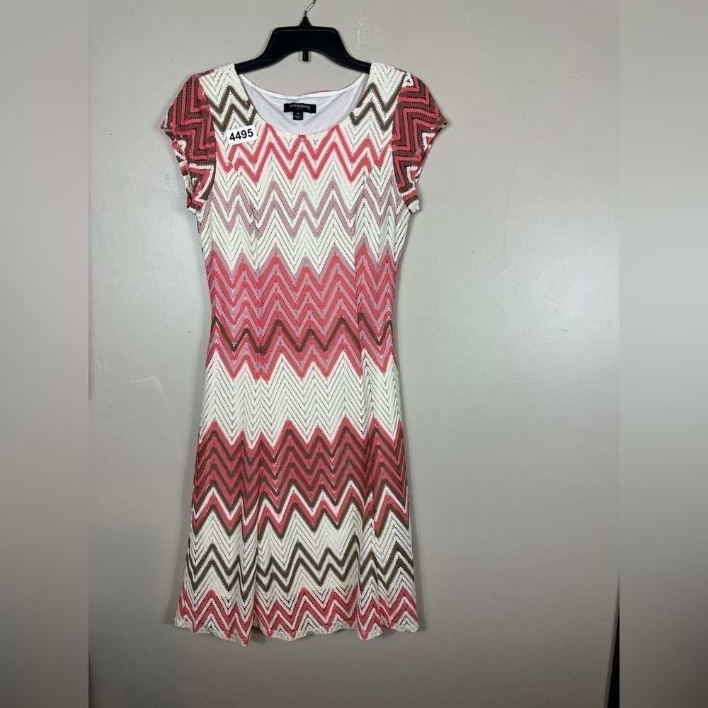 Sharagano 10 16-1/2 p2 p42” length.  Forming dress. Asymmetrical.
